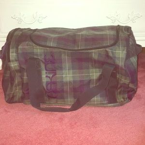 Green and purple heavy-duty duffle bag